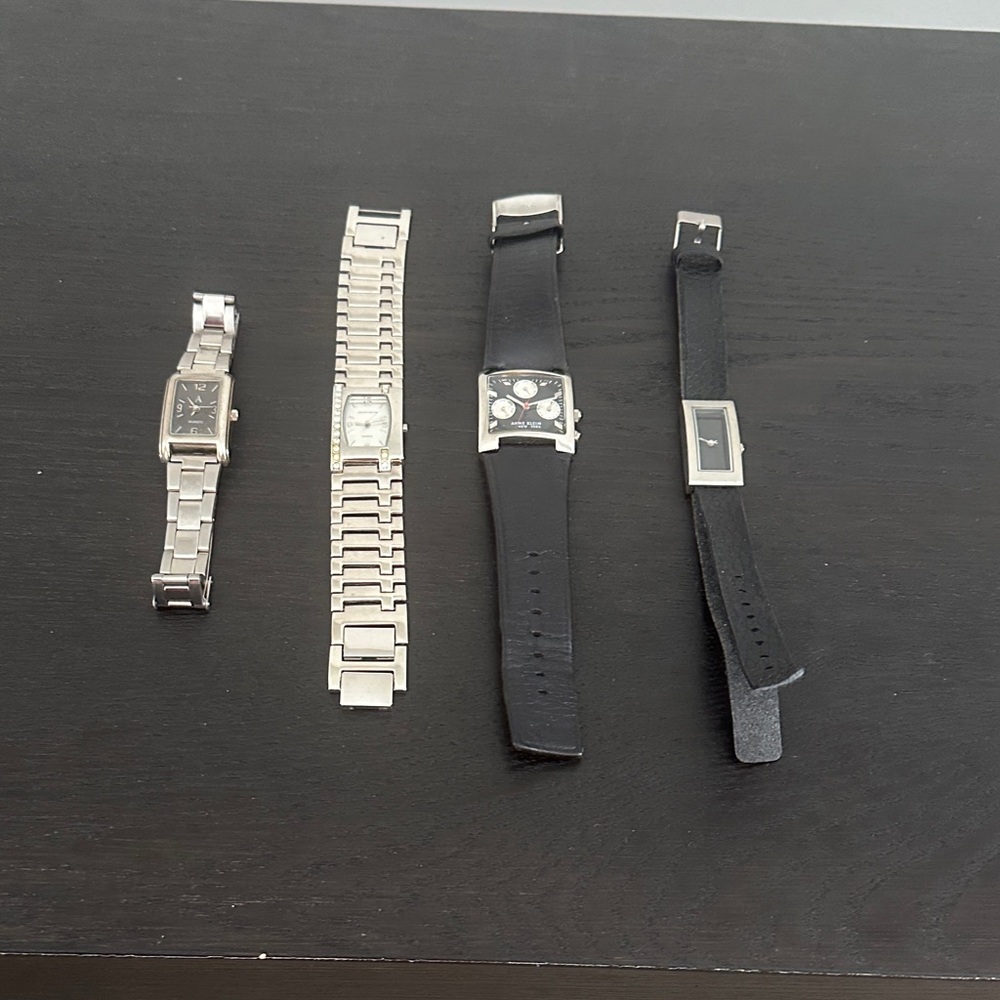 Lot of 4 silver tone watches Need  Batteries